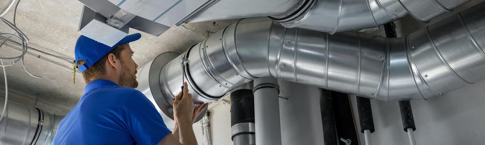 Ventilation pipe being fitted.