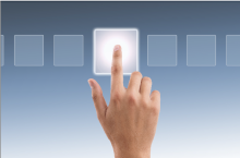 Six squares, one is lit up with a finger touching it.