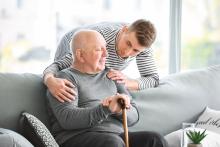 Unpaid carer with older man