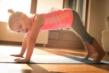 A child doing yoga