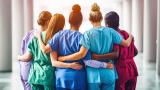 Hospital workers embrace