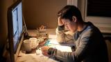 Student revising late at night for exam