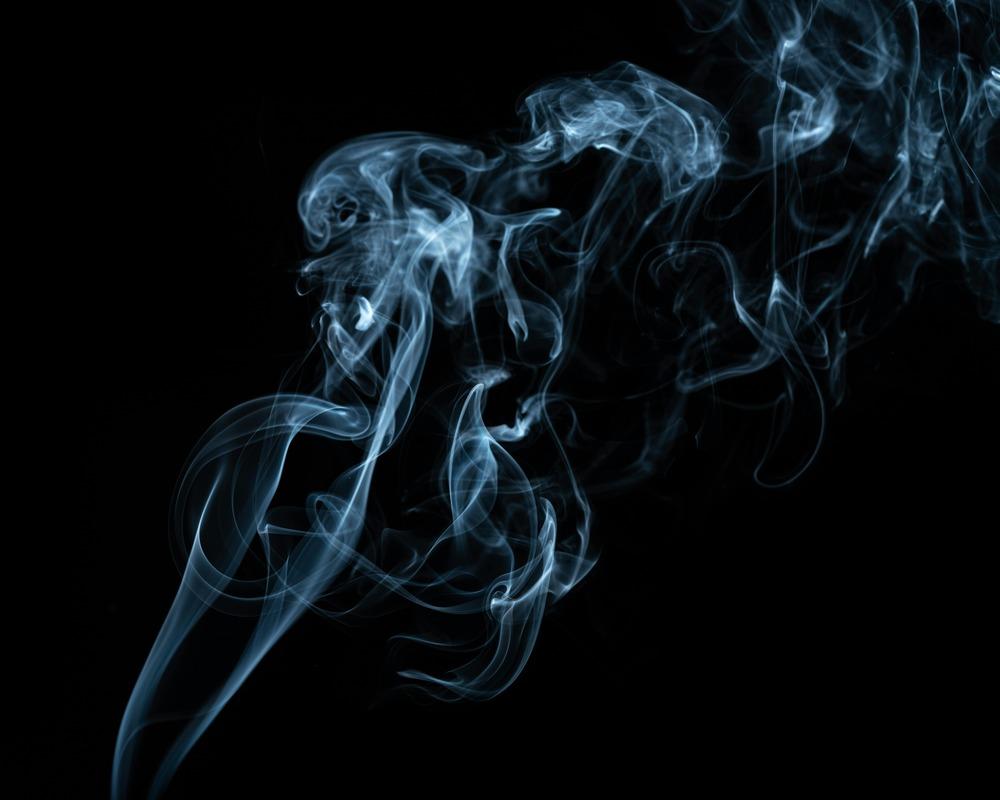 a trail of smoke on a black background. (Credit: Sklyer Ewing via Pixabay)