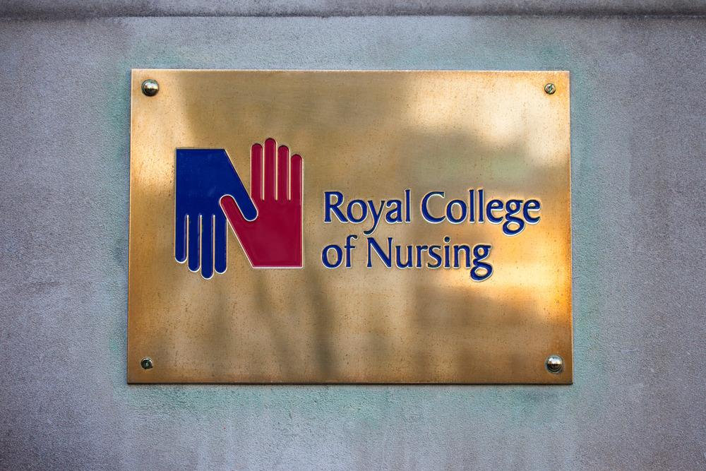A plaque with the Royal College of Nursing emblem.