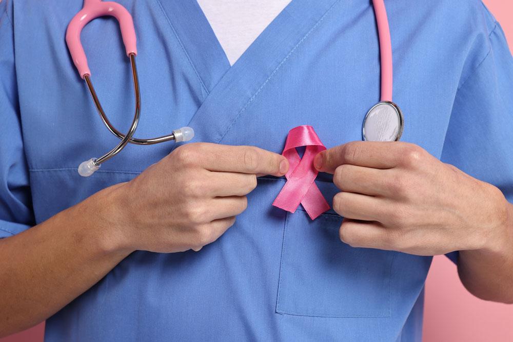 Mammalogist with pink ribbon