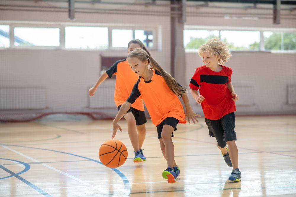 Kids playing basketball