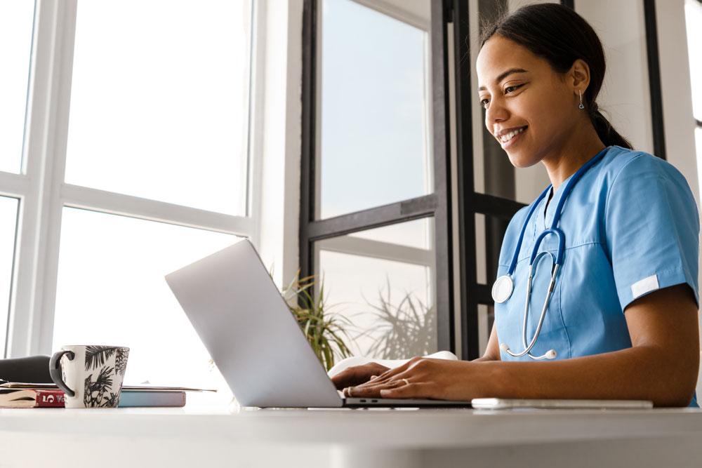 Doctor on computer