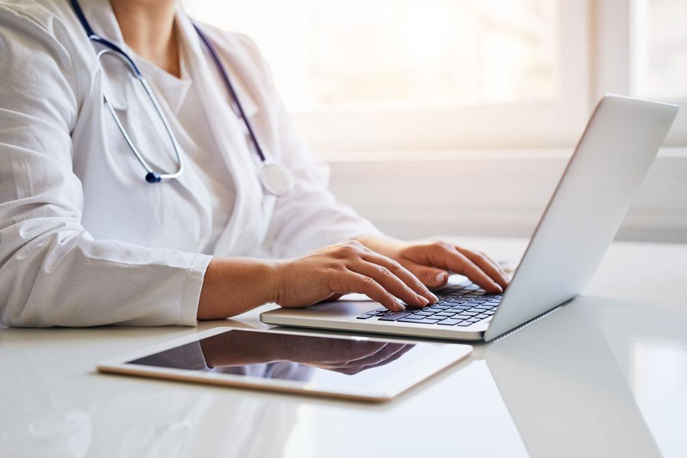 Doctor on laptop